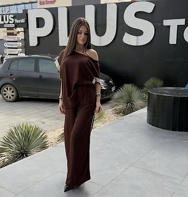 Kompleti: Ženski komplet – bluza i pantalone širokog kroja - Dizajn: ležeran i — 6