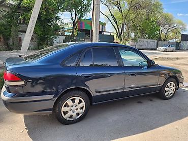 exeed lx: Mazda 626: 1999 г., 1.8 л, Автомат, Бензин, Седан — 4