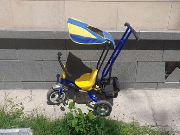 трёхколёсный детский велосипед: Коляска, цвет - Желтый, Б/у
