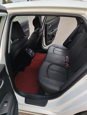 maşın opel: Kia K5: 2 l | 2017 il Sedan — 6