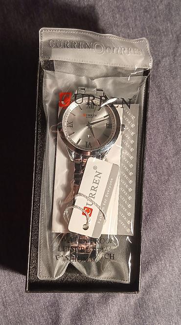 Ručni satovi: Nov ženski sat od nerdjajućeg čelika. Kvarcni mehanizam, ima datum — 10