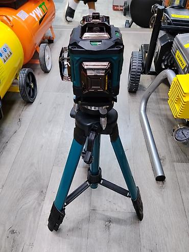 лазерный уровин: Лазерный нивелир Makita на штативе - Профессиональный 360° лазерный — 2