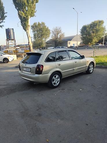 Mazda: Mazda 323: 2002 г., 1.6 л, Механика, Бензин, Универсал — 2