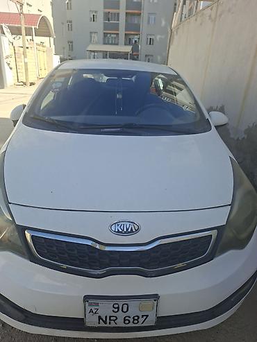 Kia: Kia Rio sedan – ağ rəng, 4 qapı, Azərbaycanda qeydiyyat (90-NR-687 — 1
