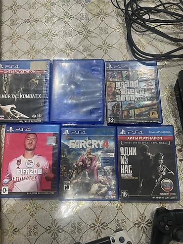 molekul 4: PlayStation 4 Slim oyun konsolu komplekti Paket tərkibi: - PS4 Slim — 2