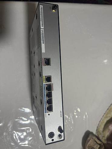 Модемы и сетевое оборудование: Huawei AR169W — корпоративный маршрутизатор доступа Основные — 4