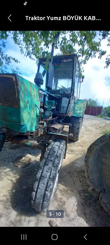 Traktorlar: YUMZ traktor – böyük kabinalı model Xüsusiyyətlər: - Dizel mühərrik — 10