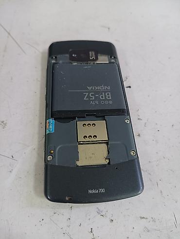 кол тараза: Nokia 700 (Symbian Belle) - Компактный сенсорный смартфон с ярким — 3