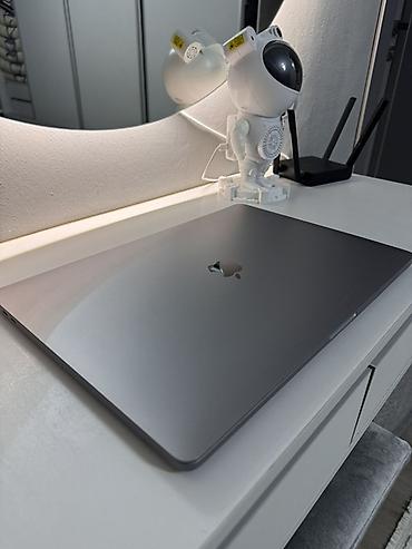 Ноутбуки Apple (MacBook): Apple MacBook Pro 16" (Space Gray) - Большой 16‑дюймовый дисплей с — 1