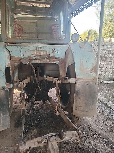 traktor 82: Kənd təsərrüfatı işləri üçün traktor. Şəkillərdə kabinalı, iri arxa — 5