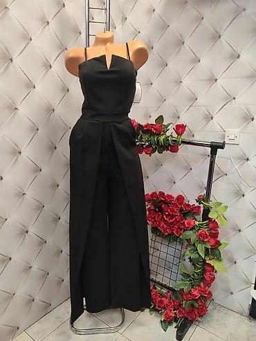 Kombinezoni: Elegantni ženski kombinezon sa širokim nogavicama - Model: kombinezon — 4