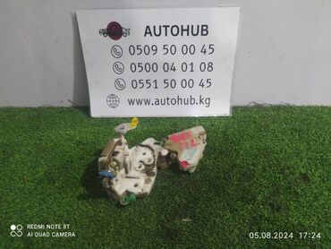 Другие детали салона: Замок двери Nissan March K11 1.0 2001 перед. лев. (б/у)