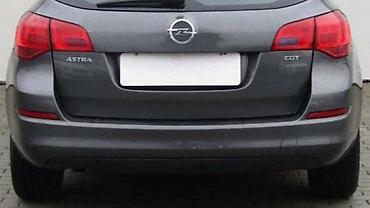 linkovi: ZADNJI BRANIK KARAVAN ZA OPEL ASTRA J OD 2009. DO 2015. GOD. | — 1