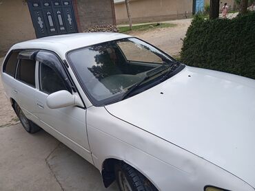 Транспорт: Toyota Corolla: 1995 г., 1.6 л, Вариатор, Бензин, Универсал