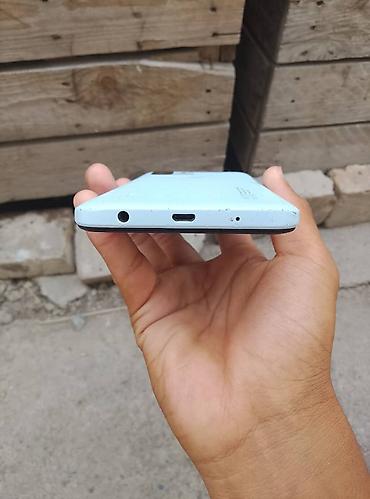 mac mini 4: Смартфон с поддержкой 4G в светло-голубом цвете. Характеристики и — 7