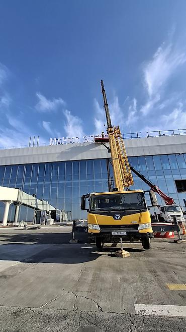 Услуги автокрана XCMG с вылетом стрелы для высотных монтажных работ