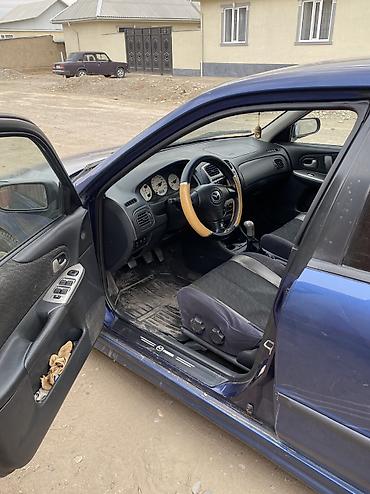 Mazda: Mazda 323: 2000 г., 1.8 л, Механика, Бензин, Хэтчбэк — 6
