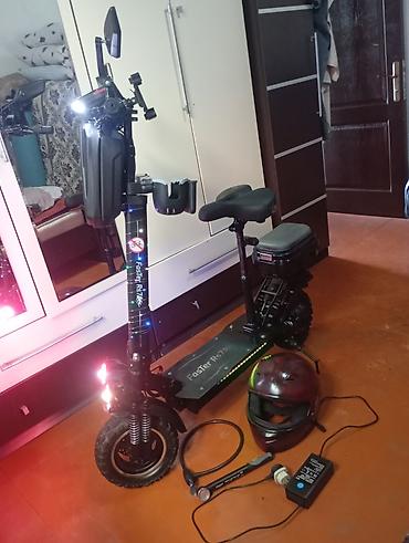 elektrikli scooter irşad: Elektrik skuter – Faster RS7 (aksesuarlarla) Özəlliklər: - Güclü — 10