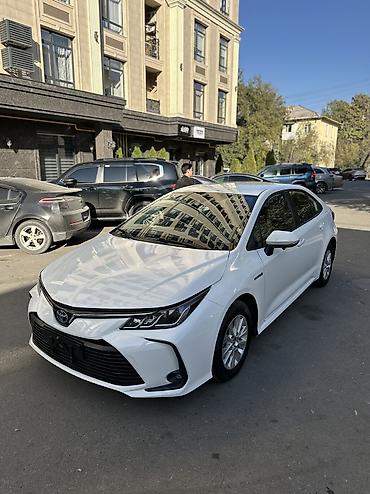лимузин цена: Toyota Corolla: 2022 г., 1.8 л, Автомат, Гибрид, Седан — 2