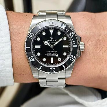 qız saatları: Rolex Submariner, qara siferblat və qara seramik (Cerachrom) — 1