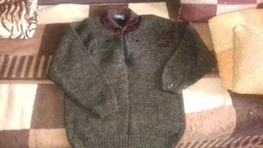 серый мужской свитер: Продаю новый шерстяной мужской свитер. Супер теплый! Размер 54. 850