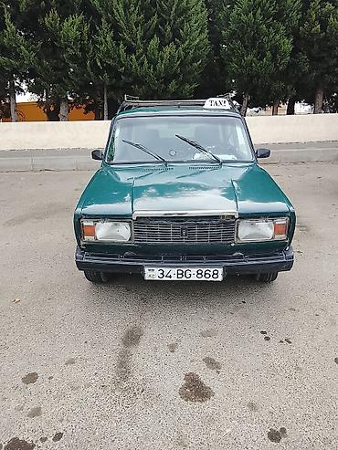 klassik maşınlar: Model: VAZ 2104 (universaI kuzov) Rəng: Tünd yaşıl Yanacaq növü — 6