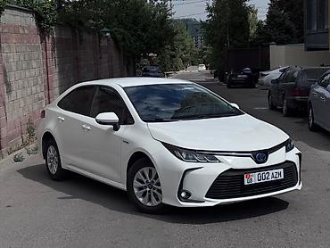 byd e1: Toyota Corolla: 2021 г., 1.8 л, Вариатор, Гибрид, Седан — 2