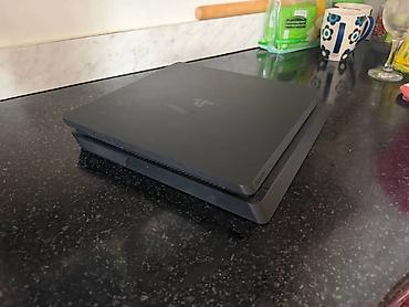 ретро консоли портативные: Sony PlayStation 4 Slim (чёрная)обмен на электро велосипед — 2