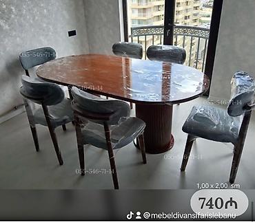 Oval formalı yemək masası və 6 ədəd stul dəsti. Xüsusiyyətlər: - Masa