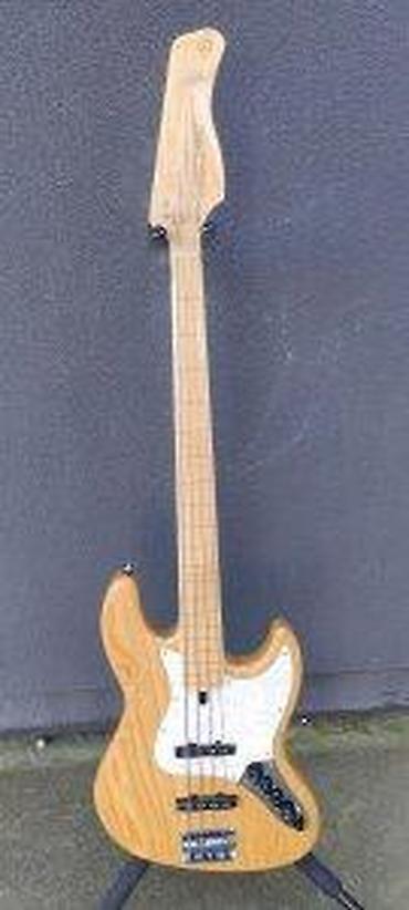 Gitare: SIRE MARCUS MILLER V7 SWAMP ASH 4-STRING FRETLESS B-STOCK | Slanje — 9