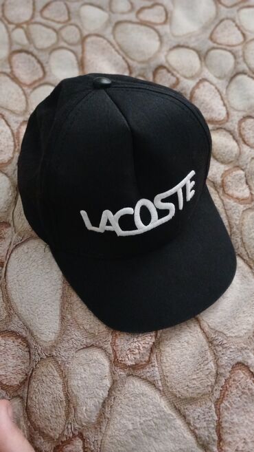 Lacoste markalı 7-10 yas arası ucun papağ