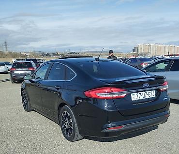 hyundai servis dərnəgul: Ford Fusion sedan – qara rəng, aerodinamik kuzov və xrom radiator — 1