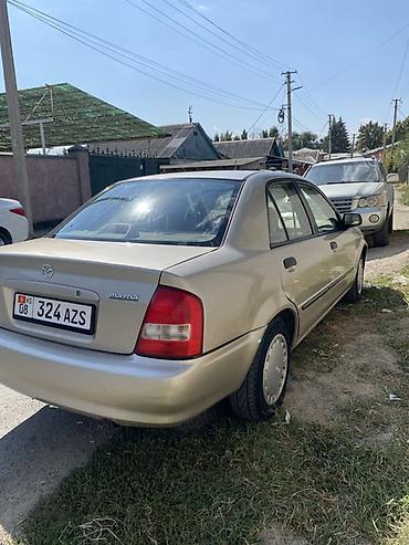 mazda 2004: Mazda 323: 2003 г., Автомат, Бензин, Седан — 8