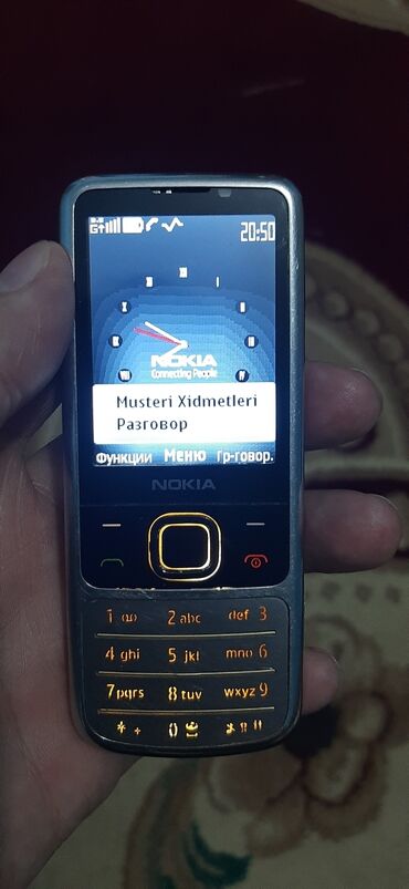 telefon kabrolar: Nokia 6700 Slide, 2 GB, rəng - Gümüşü, Düyməli