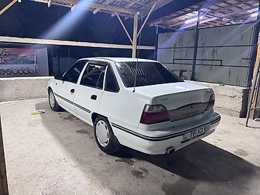 розовый матиз: Daewoo Nexia: 2004 г., Механика, Бензин, Седан — 8