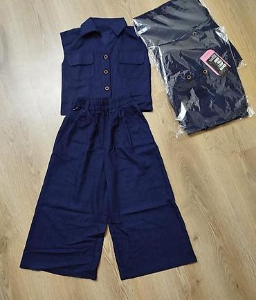 Dəstlər: Uşaq geyim dəstləri 1) Krem rəngli 2 hissəli dəst: - Qolsuz jilet — 2