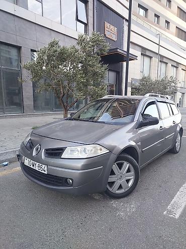 Renault: Renault Megane Grandtour (universal), boz rəng. Əsas xüsusiyyətlər: - — 7