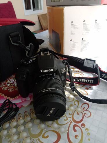 foto çanta: İdeal vəziyyətdə Canon EOS 4000D satıram.1 ildir alinib,cəmi 200-ə