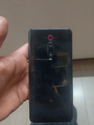 телефон fly ezzy trendy 3 белый: Xiaomi Mi 9T Pro, цвет - Черный, 
 Отпечаток пальца