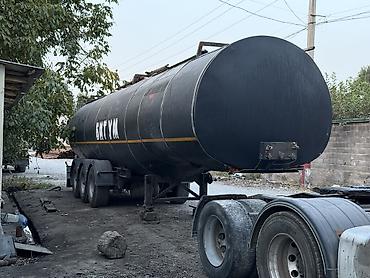 мата секыл: Полуприцеп-цистерна Schmitz Cargobull для перевозки опасных грузов. - — 2