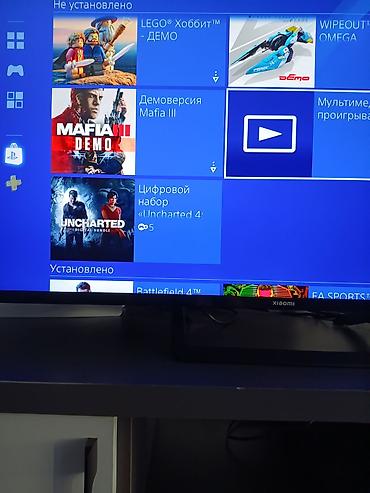 PS4 (Sony PlayStation 4): PlayStation 4 Slim (черная) Комплектация: - Консоль PS4 Slim - 2 — 2