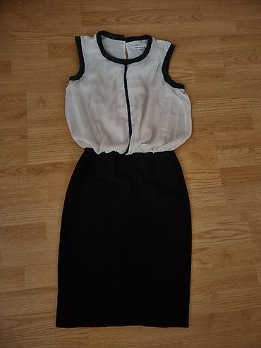 midi svečane haljine: Elegantna žensko-haljina u dve boje (crno-bela), kroja koji imitira — 1