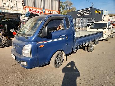 ford cargo: Услуги такси портер Hyundai Porter II бортовой малотоннажный грузовик — 1
