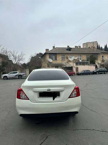 Nissan Sunny: 1.5 l | 2012 il Sedan