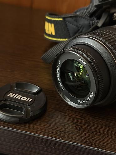 Зеркальная камера Nikon D5100 с объективом AF‑S DX NIKKOR 18–55mm