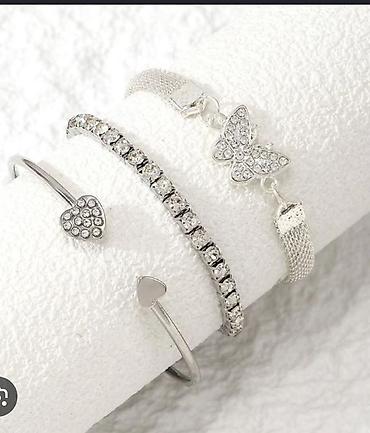 Jewellery sets: Set od 3 ženstvenе narukvice – srebrni ton, cirkoni Set od 3 narukvice — 1
