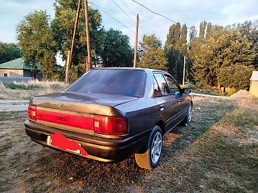 e klass: Mazda 323: 1989 г., 1.6 л, Механика, Бензин, Седан — 1