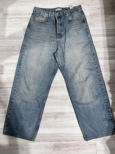 Kişi geyimləri: Geniş kəsimli mavi jeans şalvar - Material: qalın denim (pambıq — 1
