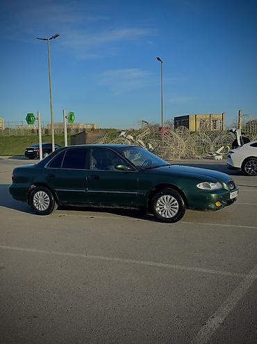 Hyundai: Hyundai Sonata: 2 l | 1997 il Sedan — 10