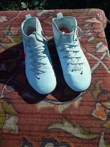 Бутсы: Футбольные бутсы/сороконожки Nike Phantom Luna Academy TF - Модель — 2